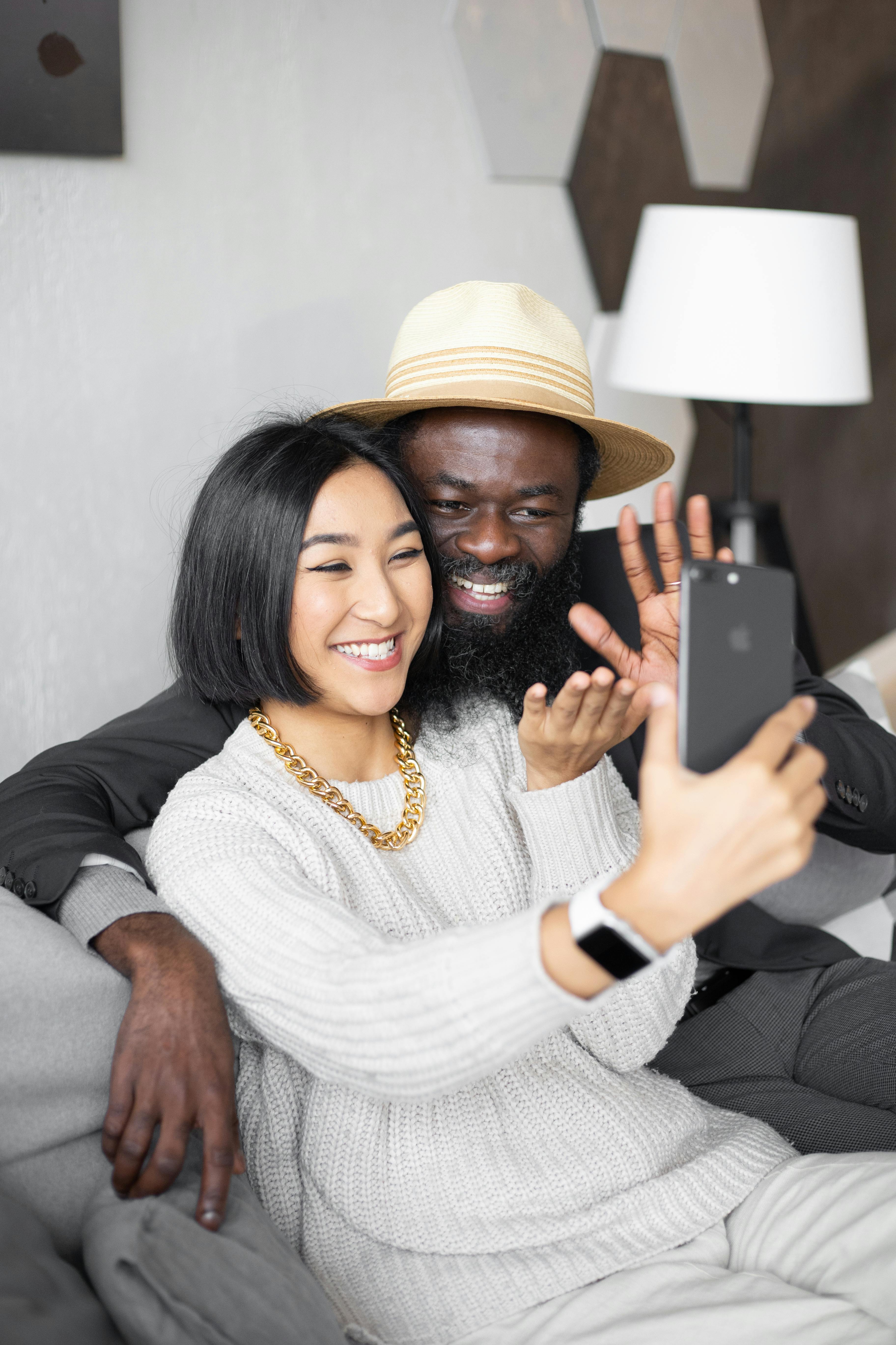 couple waving on a video call