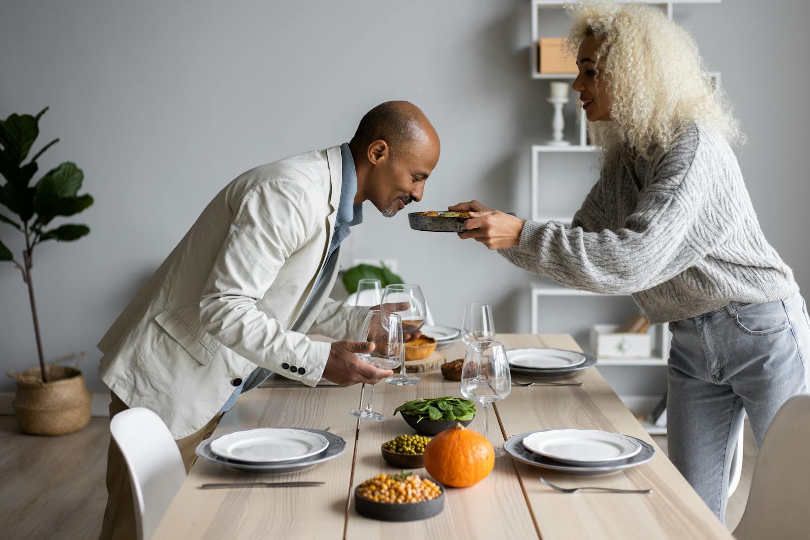 Black couple dining together at a table