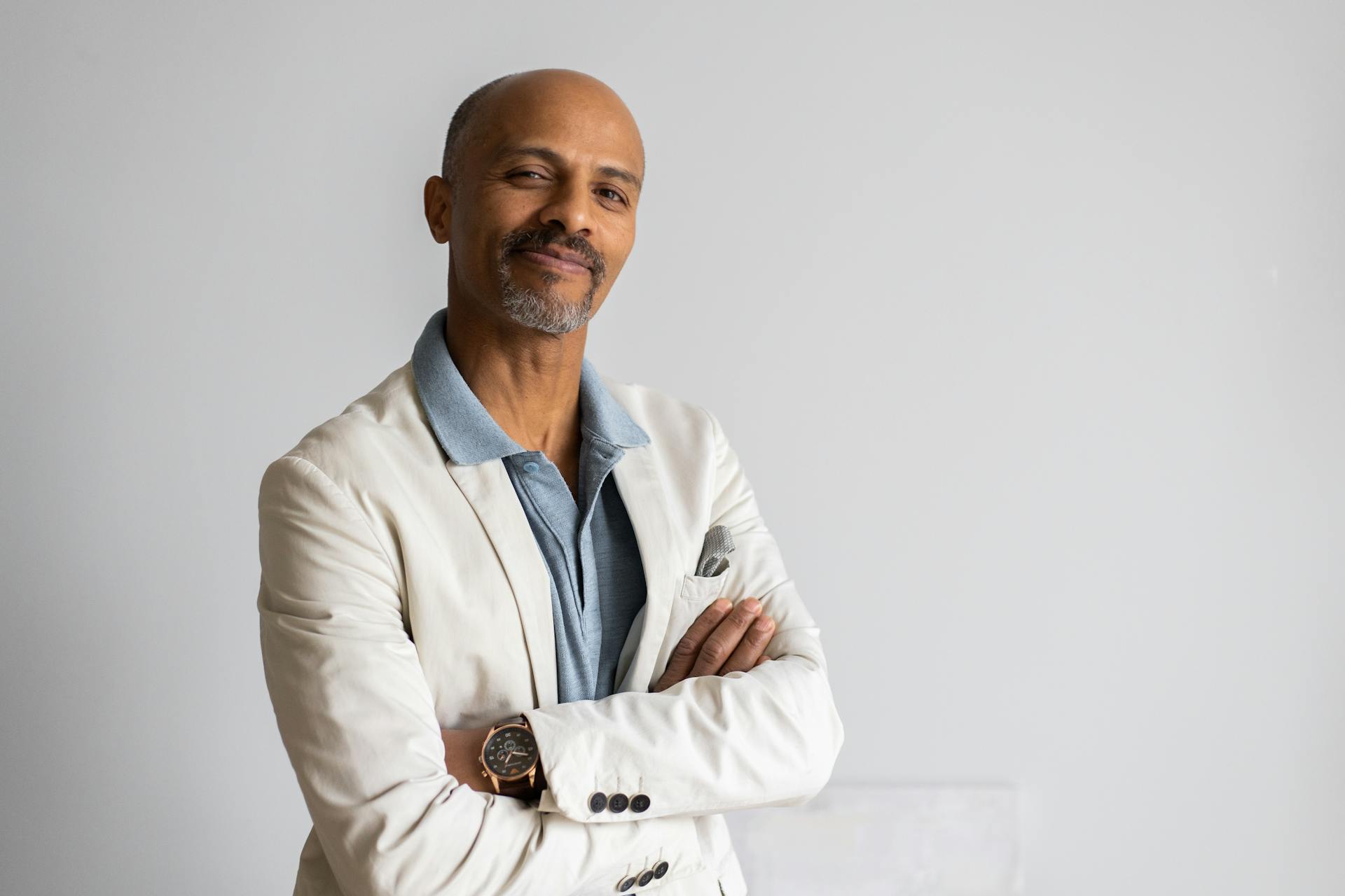 Smiling ethnic man looking at camera