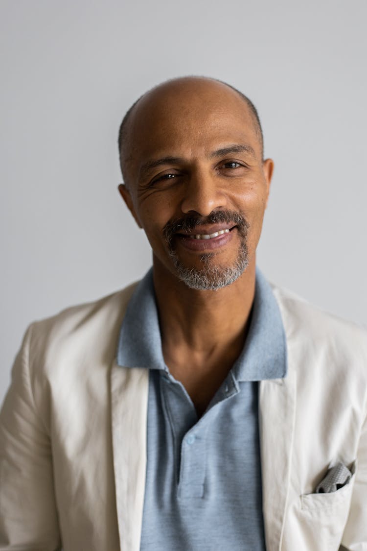 Smiling Bearded Ethnic Man Looking At Camera