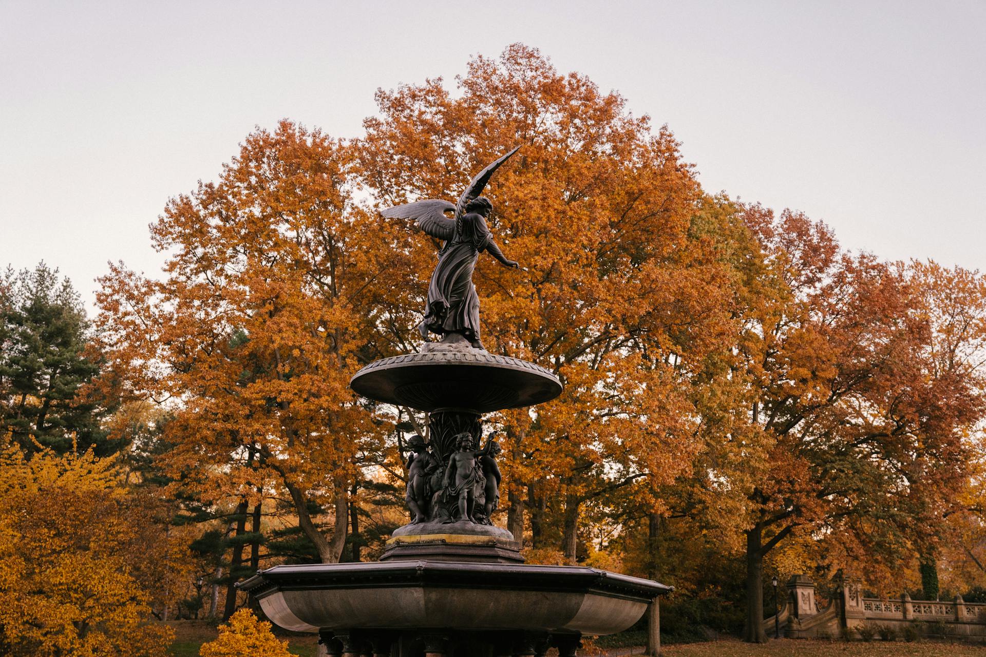 Fragment of Bethesda Fountain with Angel of the Waters statue placed in Central Park in New York City in America in autumn time