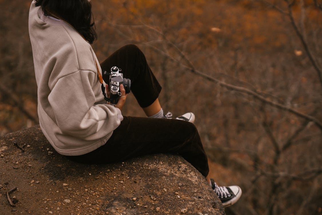 Free Crop woman with photo camera Stock Photo