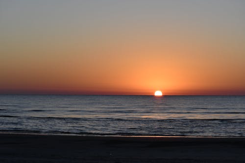 Scenic View of a Sea During Sunset