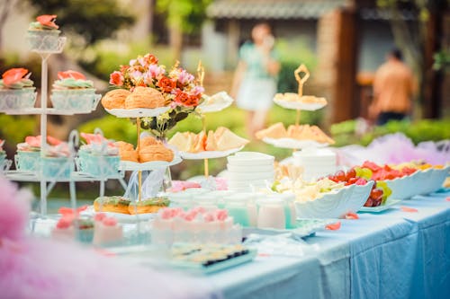 Free Various Desserts on a Table covered with Baby Blue Cover Stock Photo