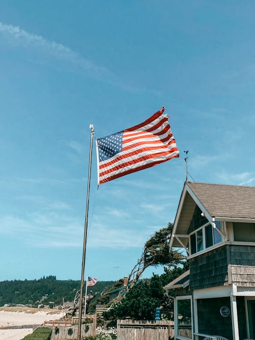 Foto profissional grátis de bandeira americana, céu azul, Estados Unidos da América