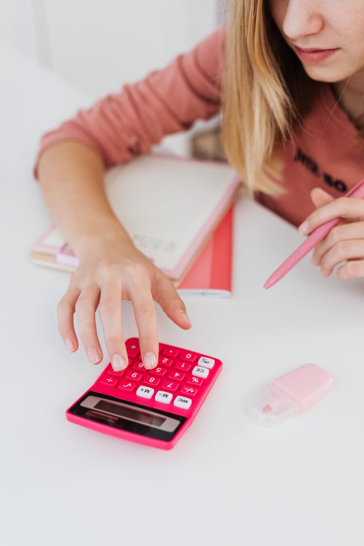 Girl Using Calculator