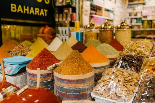 Free Colorful display of spices and dried fruits at a busy Istanbul market. Stock Photo