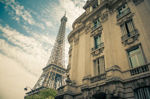 Free Eiffel Tower Under White and Blue Cloudy Sky Stock Photo