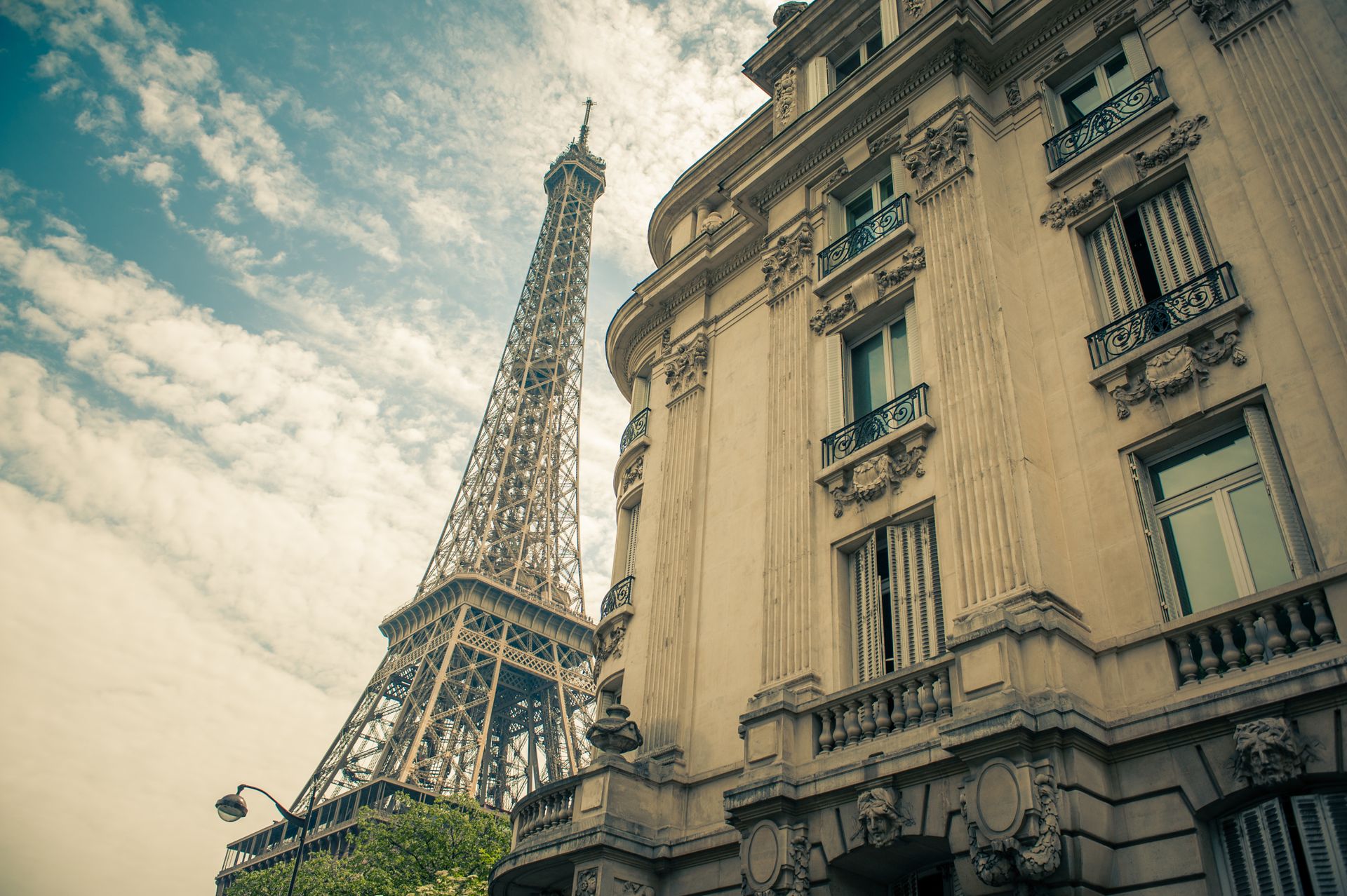 Eiffel Tower Under White and Blue Cloudy Sky