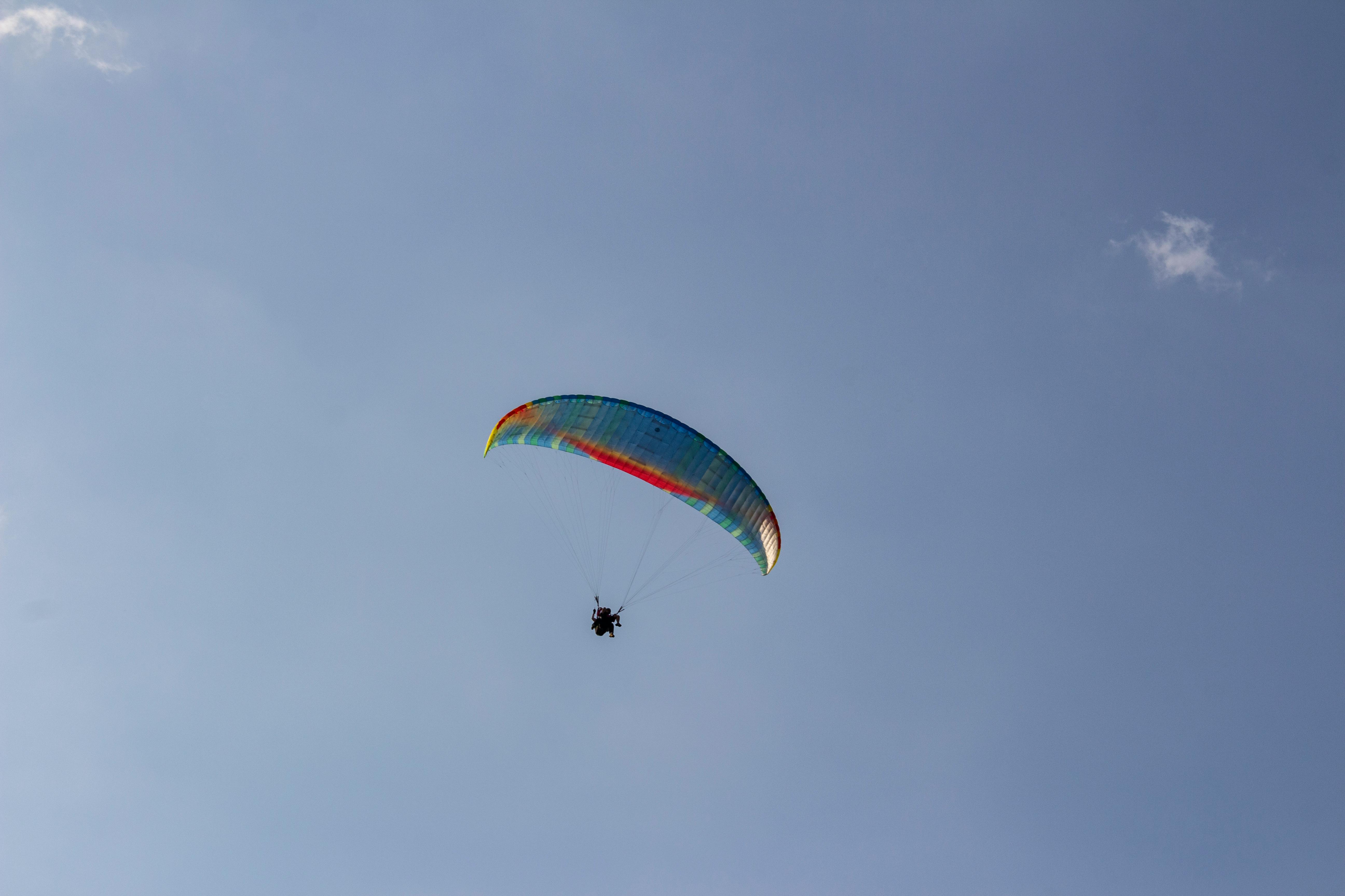 Blue Gliding Parachute · Free Stock Photo