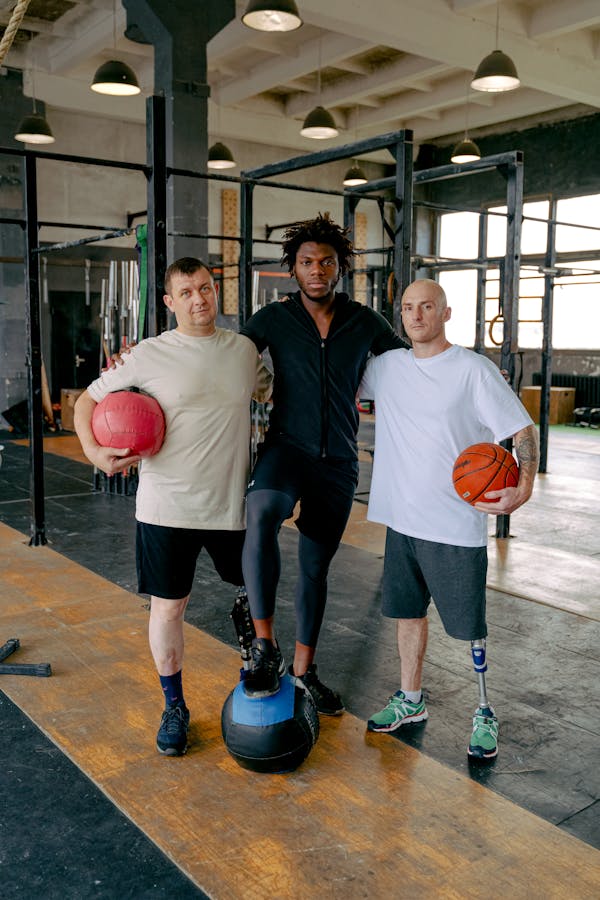 Portrait of Three Men at a Gym