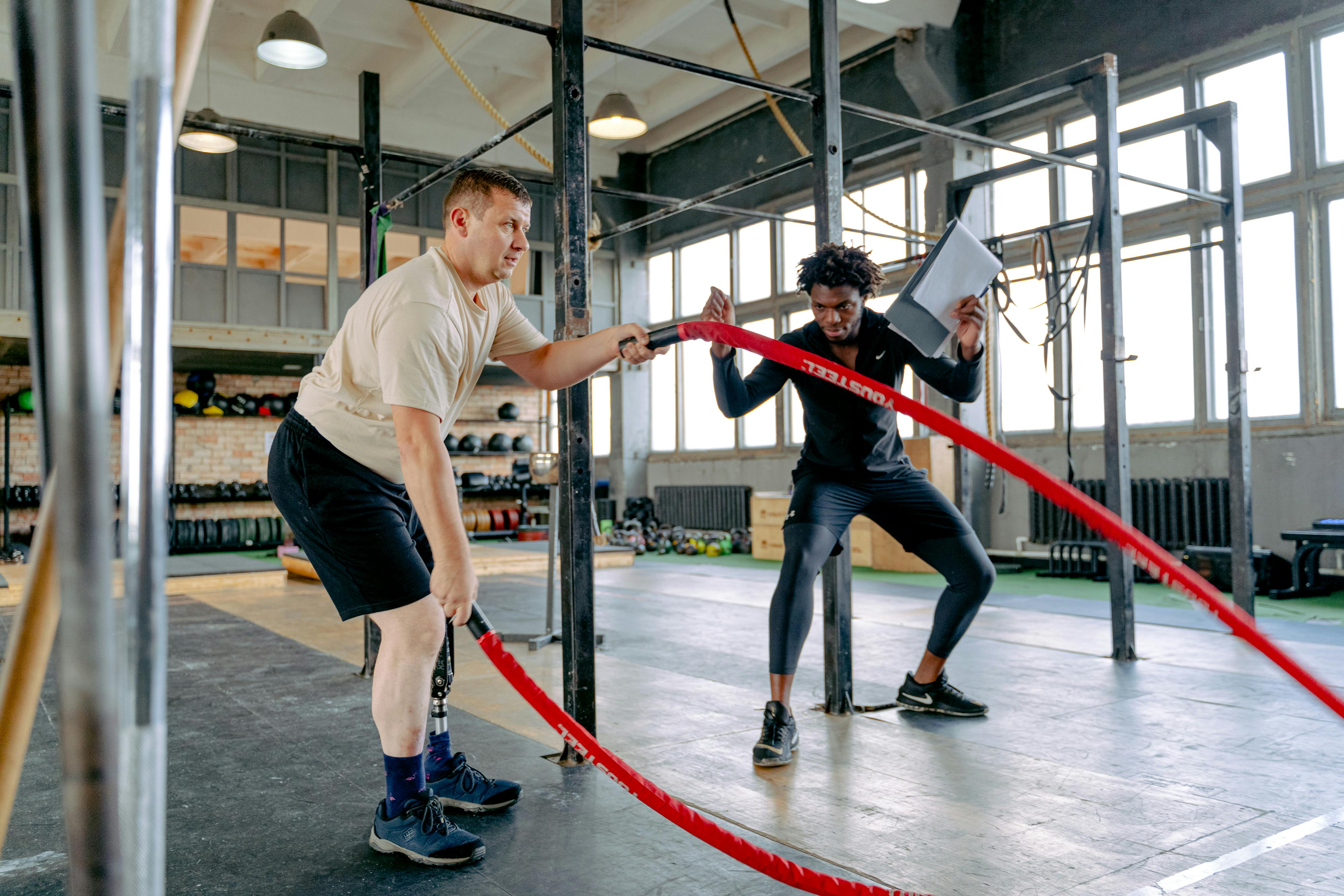 Smiling Young Couple Training Outside Together · Free Stock Photo