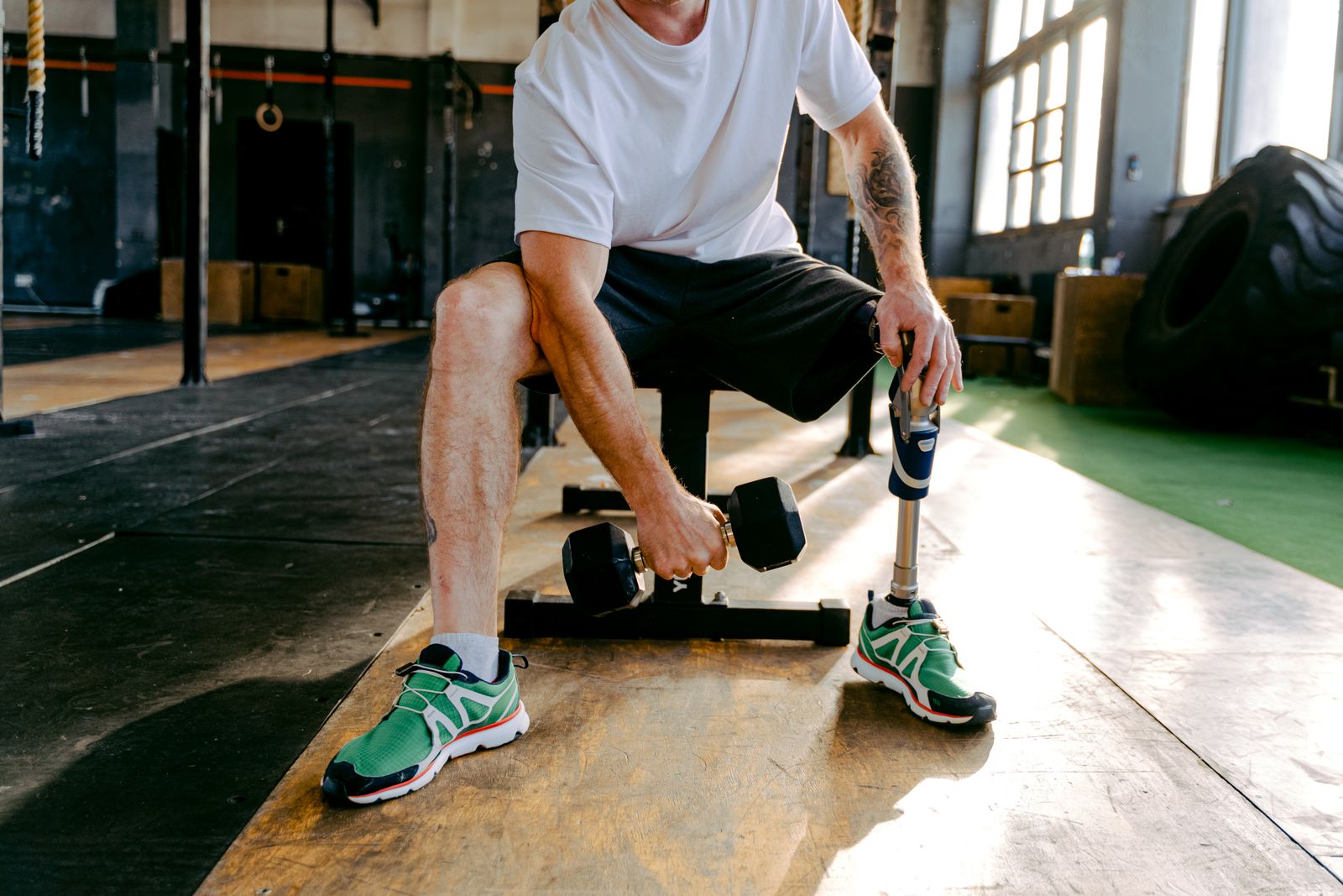 Person gently supporting the wrist and hand during a mobility check