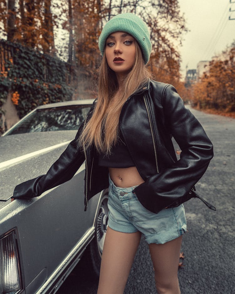 Confident Woman In Stylish Clothes Standing Near Car In Autumn