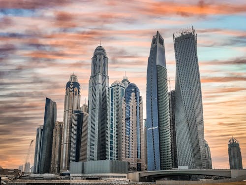 High Rise Buildings Under Cloudy Sky