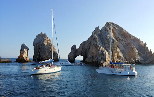 People Riding on Boats 