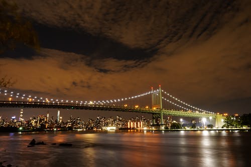 RFK Triborough Bridge and Illuminated Skyline of New York City at Night, New York, United States 