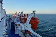 Orange Lifeboats Hanging on a Cruise Ship