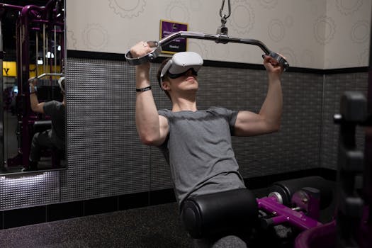 A man exercises with virtual reality goggles in a gym, combining technology and fitness.