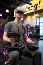 A Man Lifting Dumbbelsl while Wearing Virtual Goggles