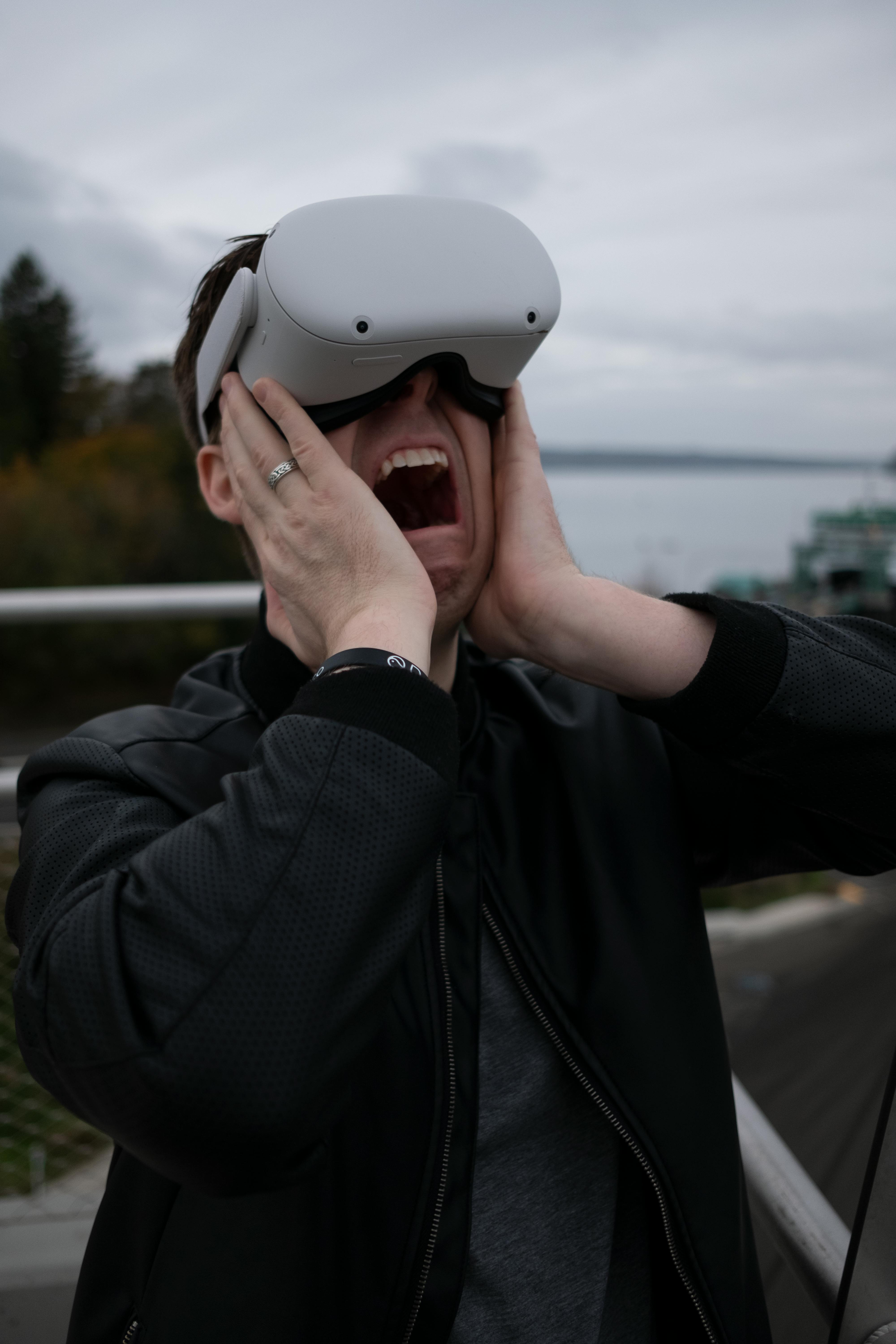 a man wearing virtual reality goggles