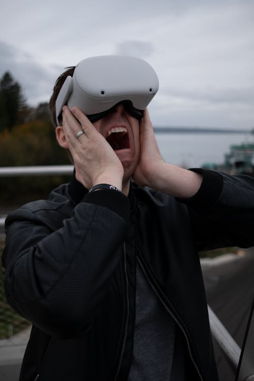 A Man Wearing Virtual Reality Goggles