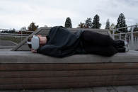 A Man Lying Down while Wearing Virtual Reality Goggles