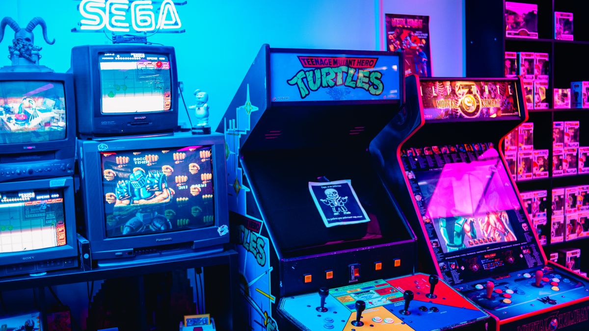 ゲーム音楽 メタル——ネオンに照らされたレトロアーケードのゲーム機が並ぶ薄暗い店内
