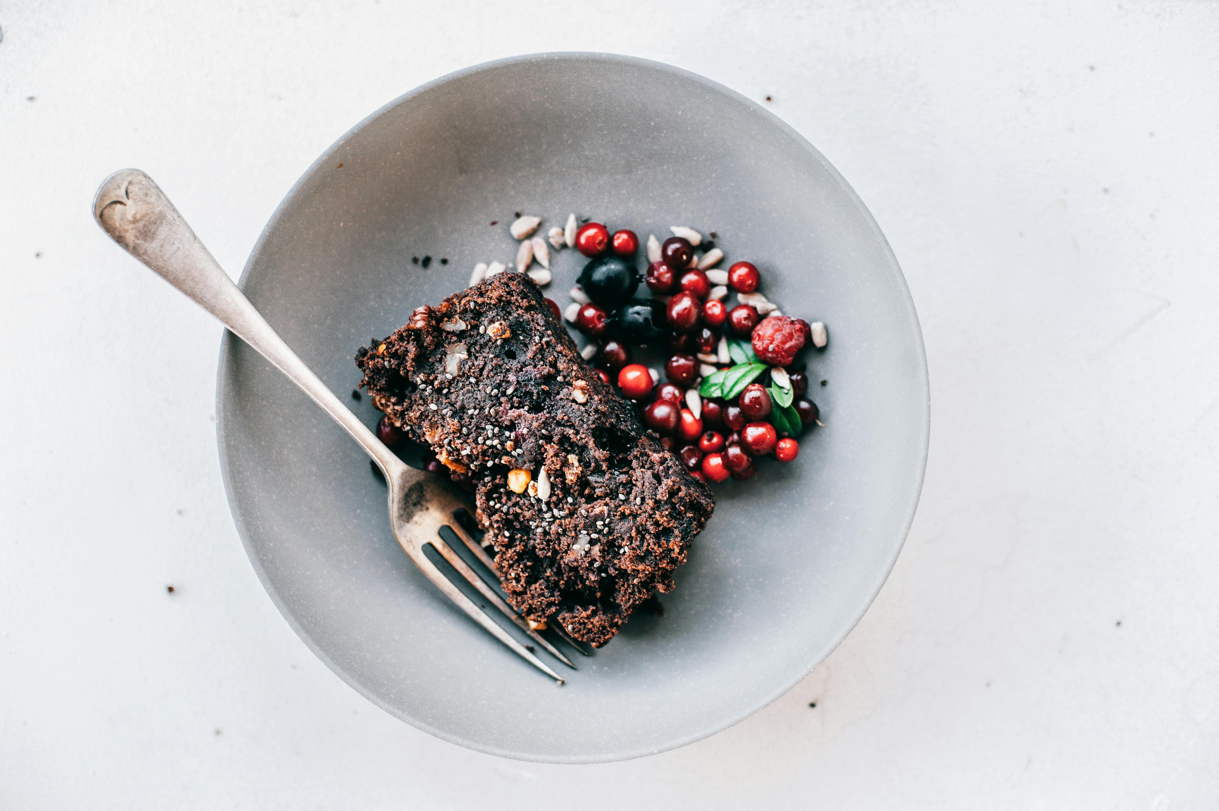 Chocolate Cake With Cherry on Round White Ceramic Plate