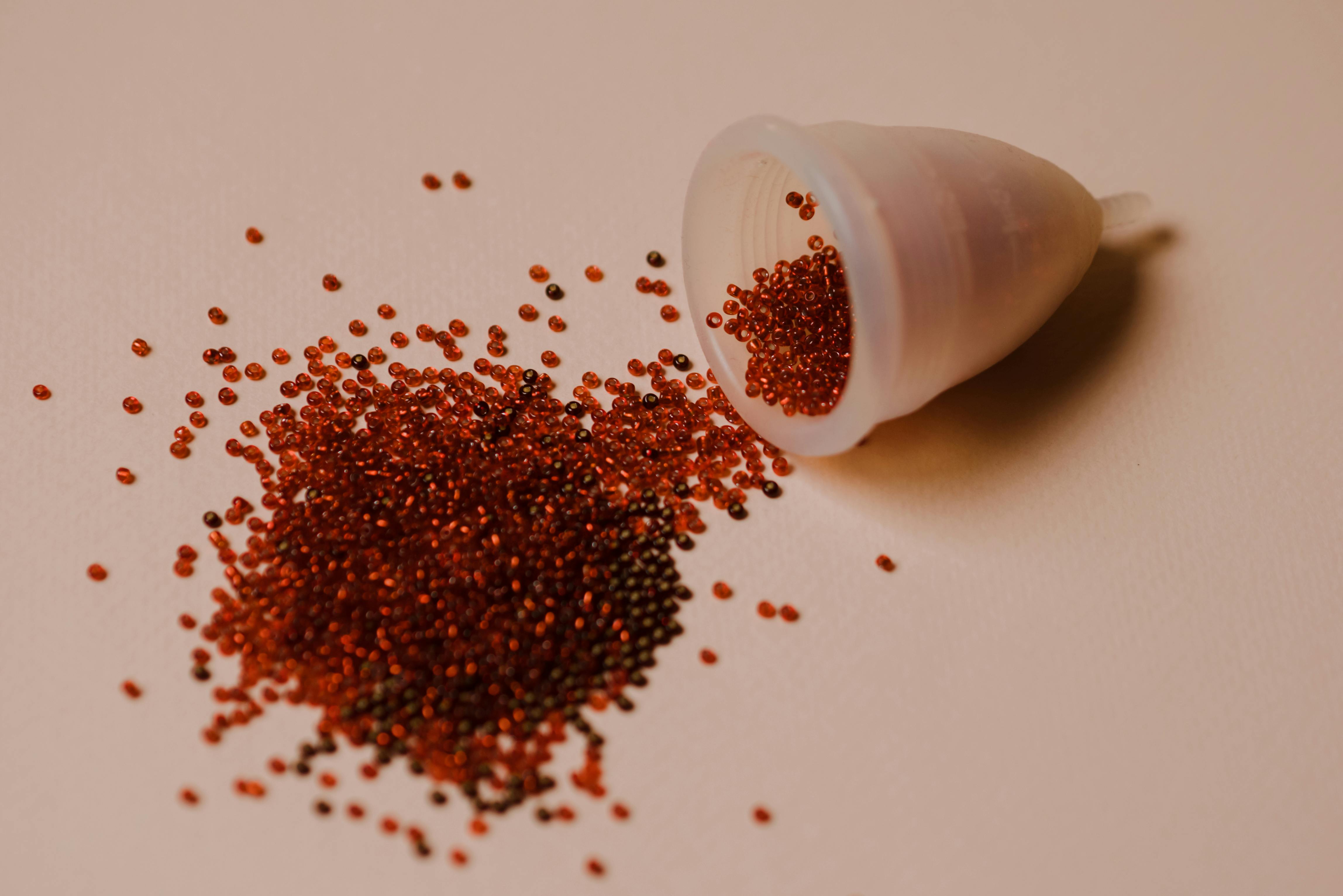 tiny red balls spilled out of menstrual cup