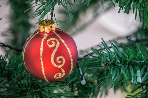 Red and Gold Bauble on Christmas Tree
