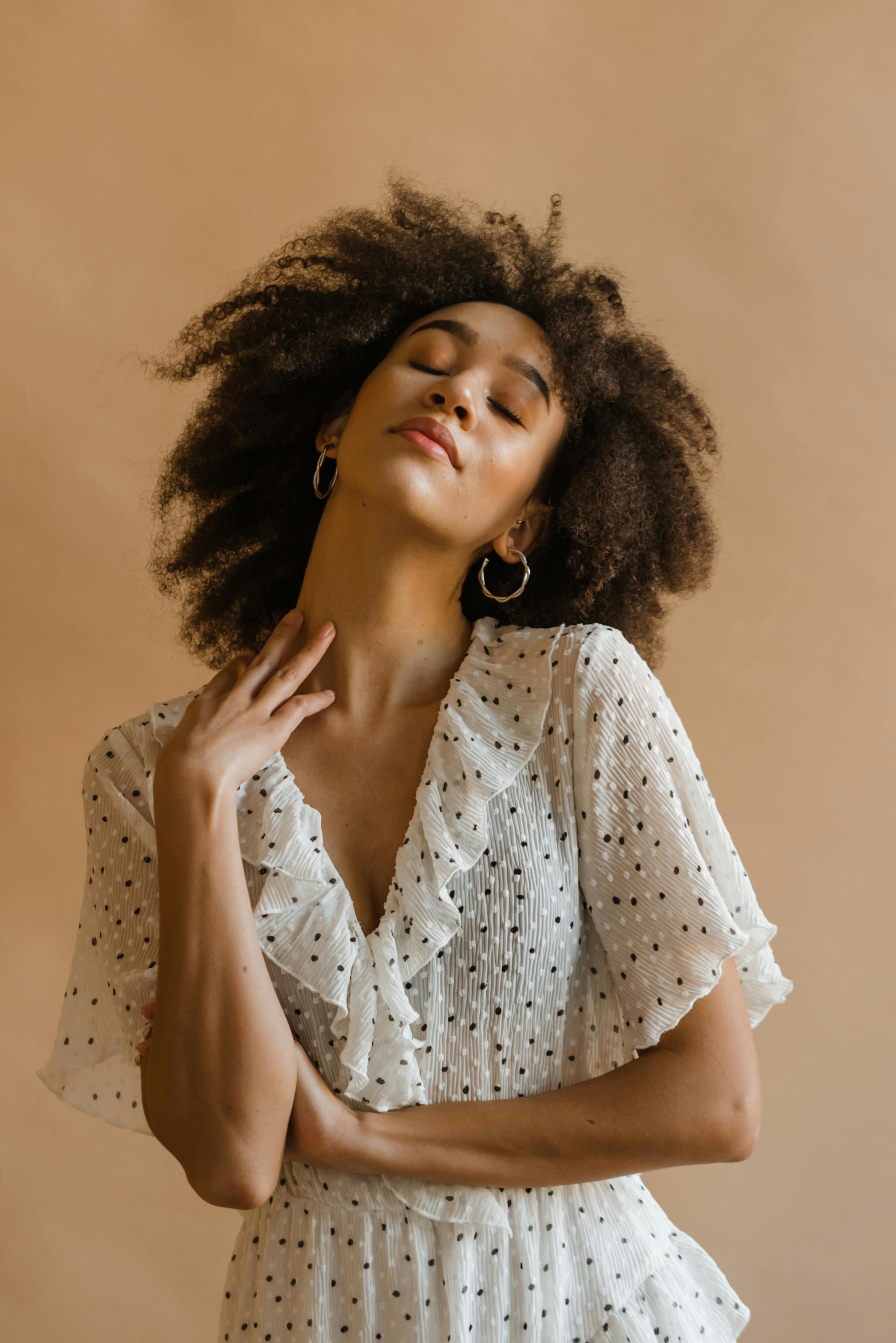 Photo of Woman Wearing Polka Dots Blouse and Skirt · Free Stock Photo