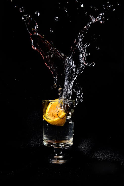 Free Orange on Drinking Glass Stock Photo