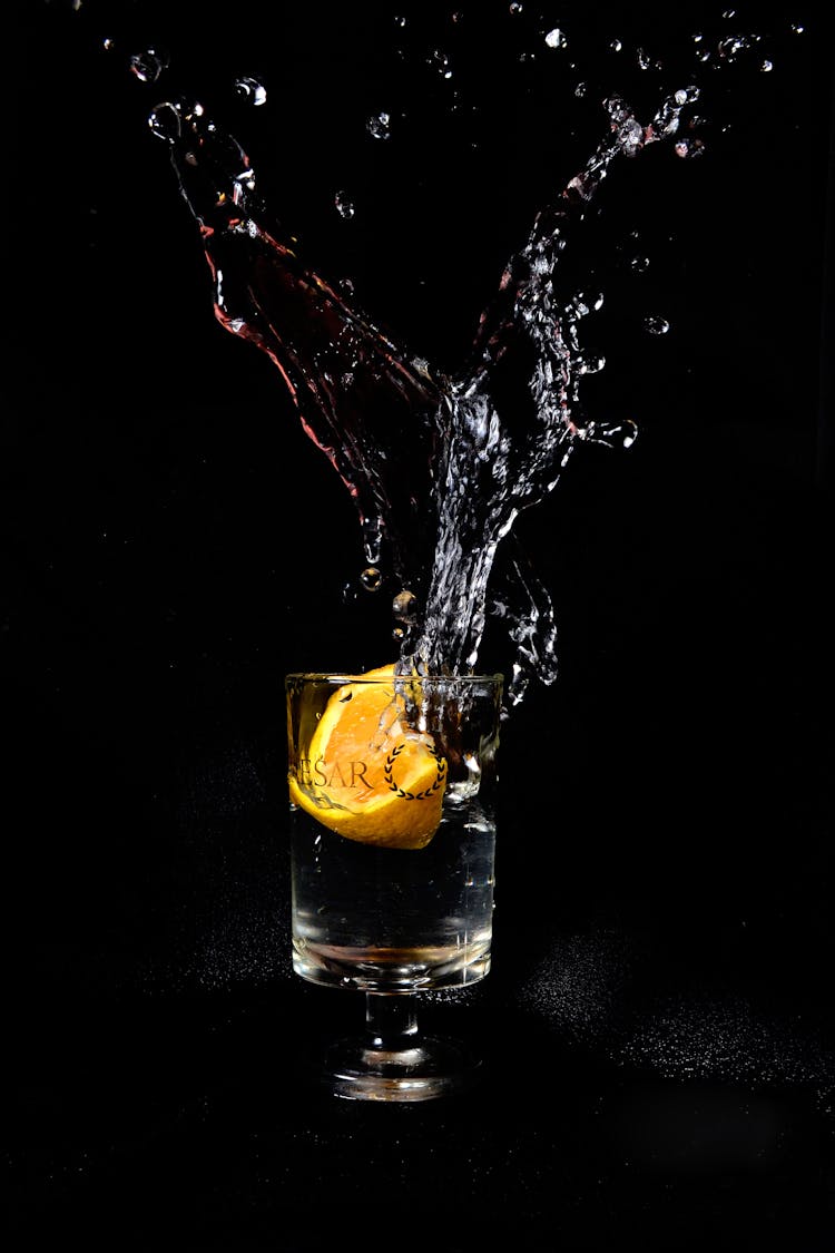 Orange On Drinking Glass