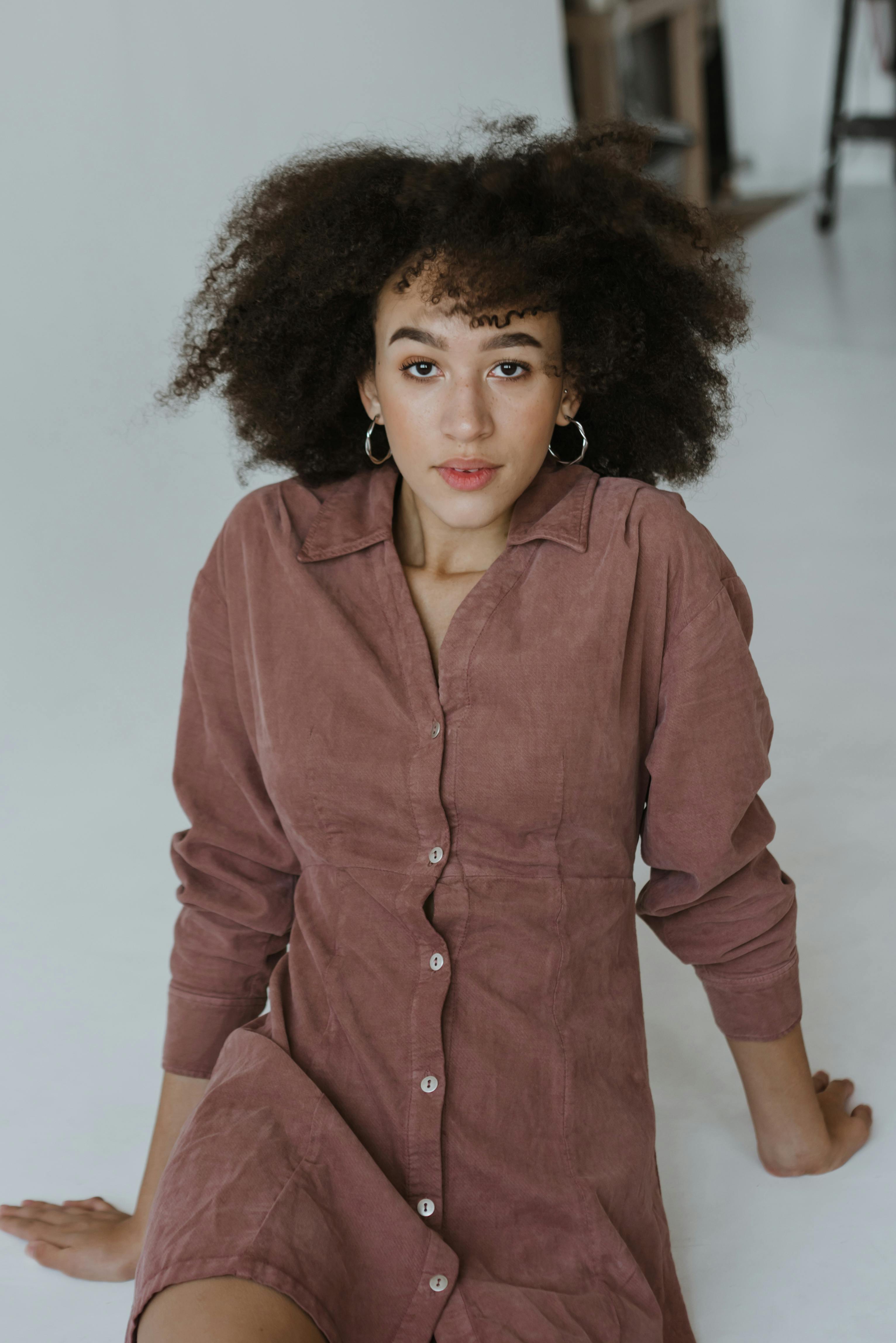 Woman in Brown Button Up Long Sleeve Shirt · Free Stock Photo