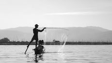 Silhouette of Man in Water Fountain