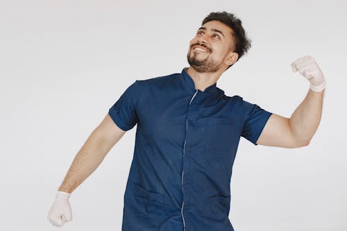 Man in Blue Scrub Suit Smiling