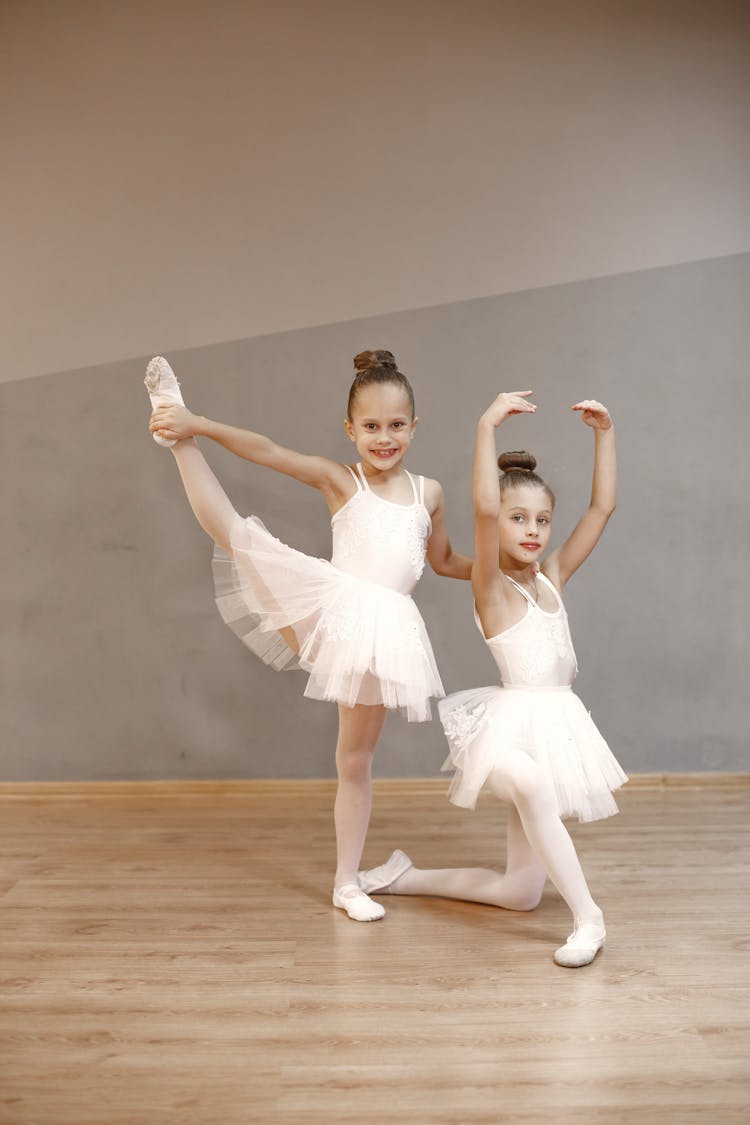 Young Ballerinas Posing At The Camera