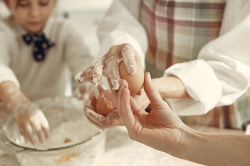 Free Eggs in Hands Stock Photo