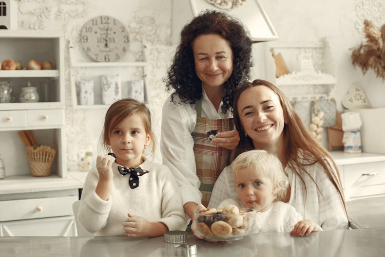 A Happy Family Eating Baked Goods 