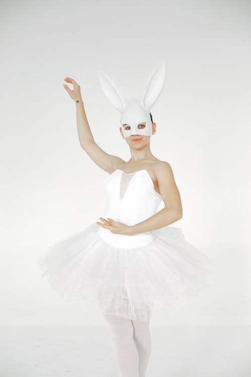 Woman in White Tutu and Rabbit Mask