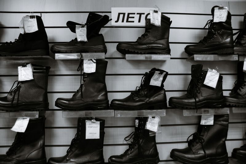 Repaired leather shoes ready for pickup on the shelf