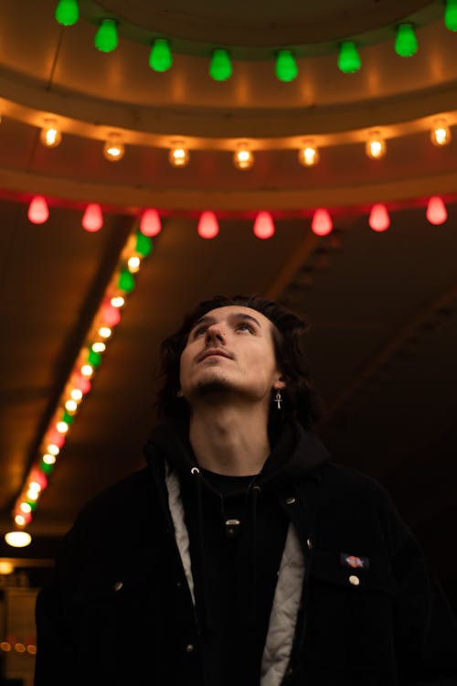 Free Portrait of a Man Looking at the Lights Stock Photo