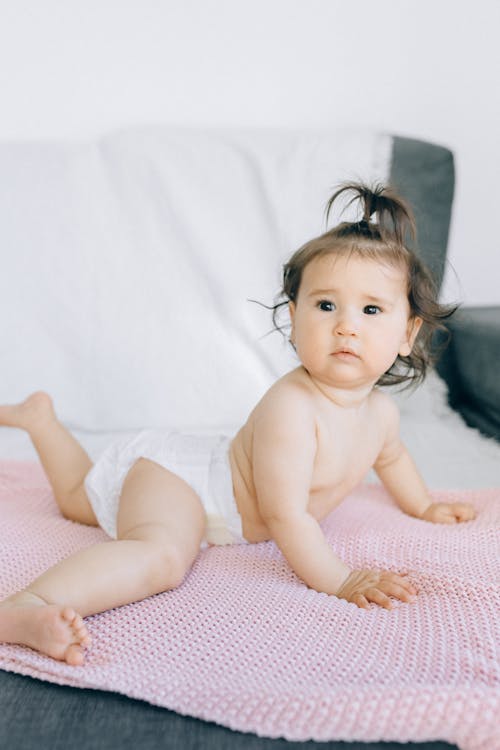 Free Baby Wearing a Diaper Stock Photo