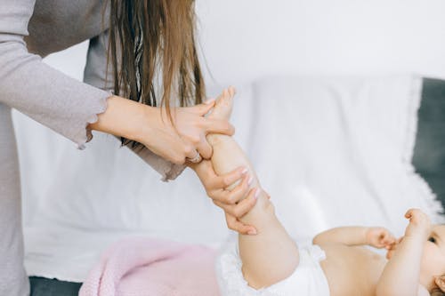 Free Baby Getting a Massage Stock Photo