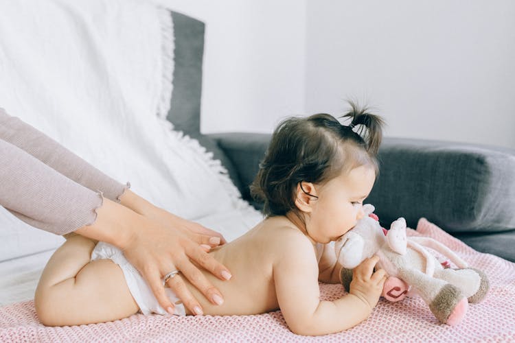 Baby Getting A Back Massage