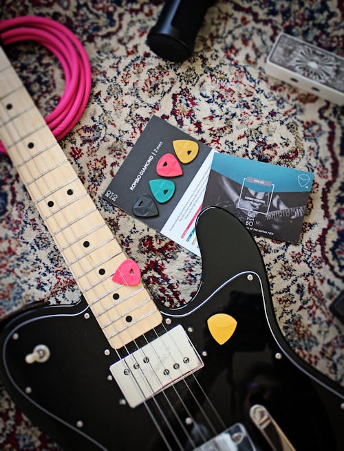 Close-Up Photo of Black Electric Guitar