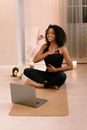 Woman with Curly Hair Doing Yoga