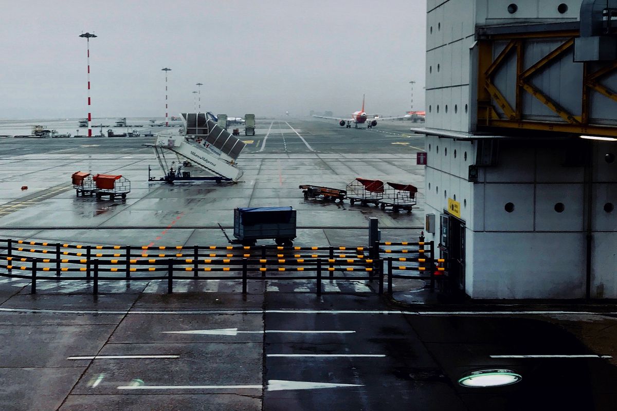 Bright airport terminal windows overlooking the apron