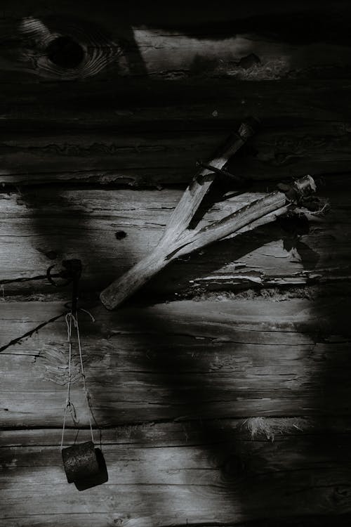 Wooden tool hanging on wall